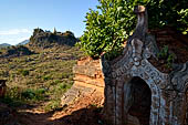 Inle Lake Myanmar. Indein, a cluster of ancient stupas  ruined and overgrown with bushes, just behind the village. 